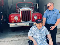 The visit brought back many memories for Roy Derebery, who received a hat from Clay Watts.