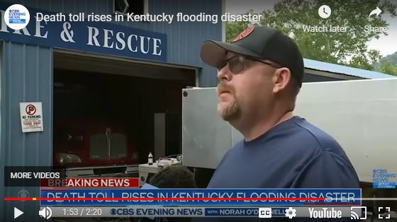 Letcher Chief Wallace Bolling Jr. talks about spending about 15 hours atop the tanker behind him as the flood waters raged.