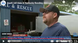 Letcher Chief Wallace Bolling Jr. talks about spending about 15 hours atop the tanker behind him as the flood waters raged.