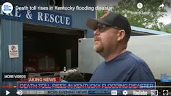 Letcher Chief Wallace Bolling Jr. talks about spending about 15 hours atop the tanker behind him as the flood waters raged.