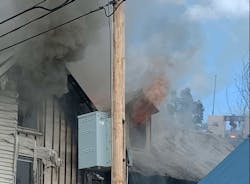 Flames were visible from the second floor of the Norway building. Flames were visible from the second floor of the Norway building.