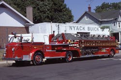 Aerial ladders typically were painted gray, which provided some contrast against the sky and which was claimed to be reasonably easy to maintain and keep clean. The Chelsea Hook and Ladder Company of Nyack, NY, once operated with this 1955 American LaFrance 100-foot tractor-drawn aerial ladder.