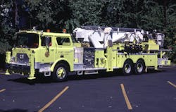 During the 1970s, several departments adopted a lime green paint scheme for new apparatus, such as this 1975 Mack CF 75-foot tower ladder of the West Nyack, NY, Fire Department. Note that the boom on the tower was painted white, which was common for this era and enhanced visibility during fireground operations.