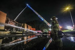 Crews with the South Fulton Fire and Rescue Department aggressively attacked a fire in the Atlanta Custom Ironworks warehouse early Tuesday morning. The building houses oxygen and propane cannisters, as well as painting materials, fire Lt. Eric Jackson said. The cause of the fire remains under investigation.