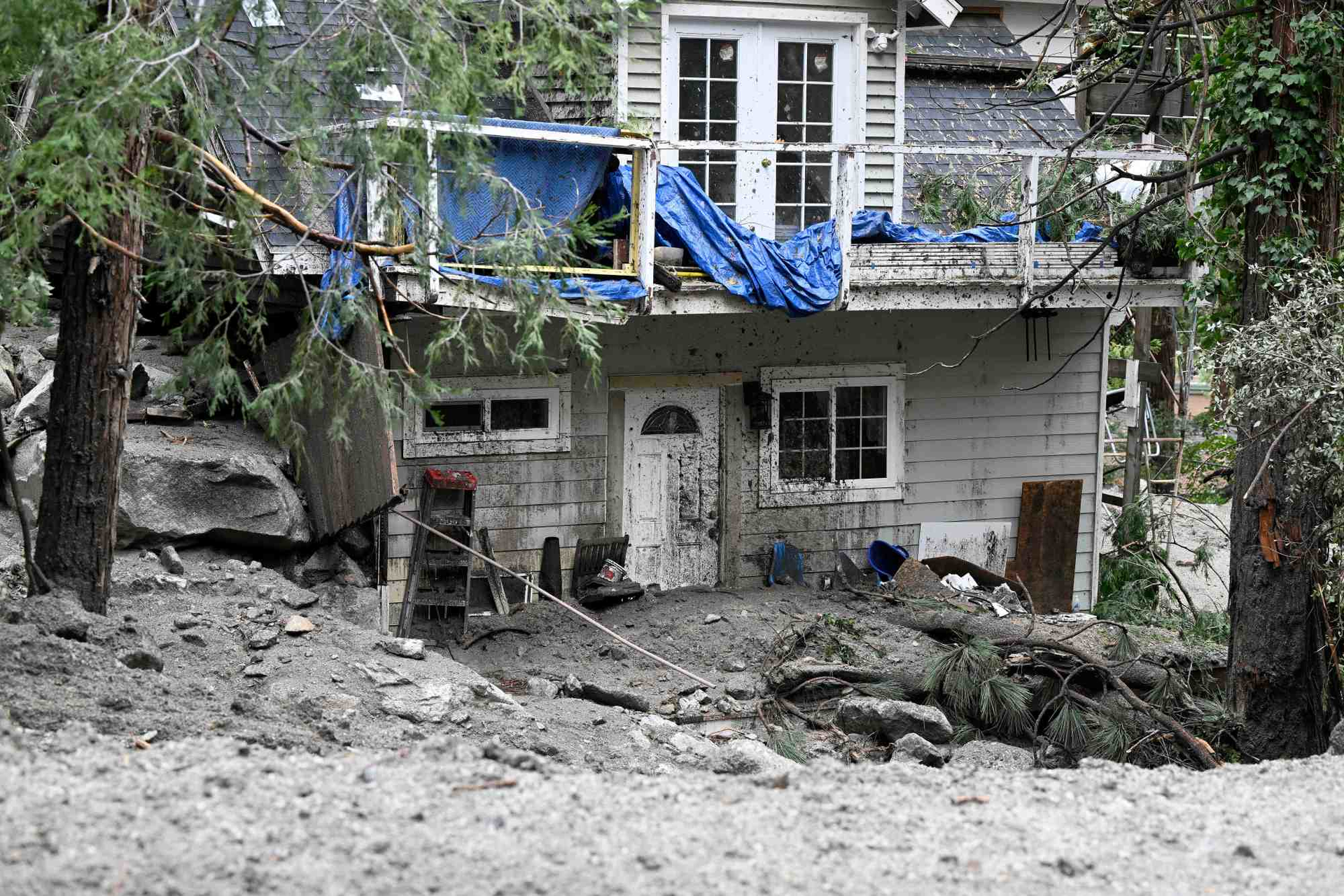 A home sits damaged on Prospect Drive in Forest Falls on Tuesday, Sept. 13, 2022, after heavy mud flows hit the area Monday afternoon. (Photo by Will Lester, Inland Valley Daily Bulletin/SCNG)