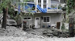 A home sits damaged on Prospect Drive in Forest Falls on Tuesday, Sept. 13, 2022, after heavy mud flows hit the area Monday afternoon. (Photo by Will Lester, Inland Valley Daily Bulletin/SCNG)