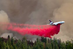 An air tanker drops fire retardant on the Mosquito fire earlier this month.
