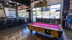 The decoration inside Halligans pub honors first responders and is owned by retired Lexington firefighter Otis Cveticanin. The decoration inside Halligans pub honors first responders and is owned by retired Lexington firefighter Otis Cveticanin.