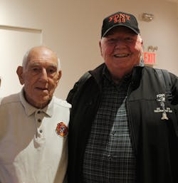Retired FDNY Capt. Louis Andrade (left) and Lt. Kevin O&apos;Kane were on at the opening of the exhibit at the New York City Fire Museum.