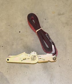 Photo 2. The no-hook ratchet strap that’s used for lashing. Photo 2. The no-hook ratchet strap that’s used for lashing.