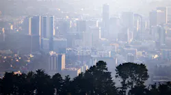 Hazy skies from the wildfires cover Oakland and the East Bay is seen from the Berkeley hills last month.