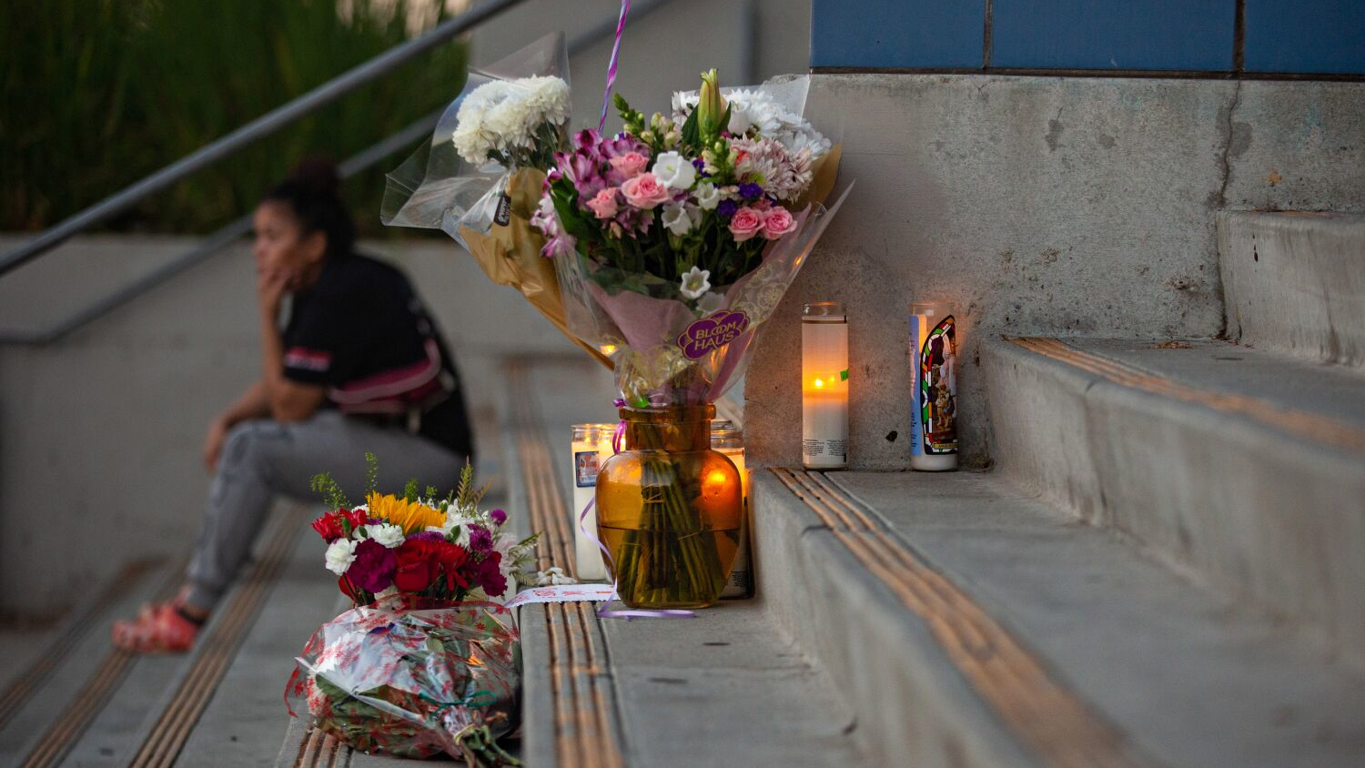 Flowers and candles at Helen Bernstein High School in Los Angeles where a teenage girl died of a overdose in September 2022.