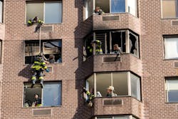 FDNY firefighters used rope to rescue victims trapped in a Manhattan high-rise fire Saturday morning. FDNY firefighters used rope to rescue victims trapped in a Manhattan high-rise fire Saturday morning.