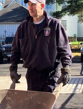 A Hartford firefighter gets ready to haul mulch.