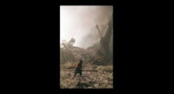 An FDNY firefighter works in the rubble of the World Trade Center.