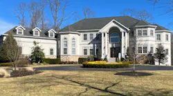 This residential structure is more 10,000 square feet and is set back from the street. Suppression operations are hindered by both of these attributes.