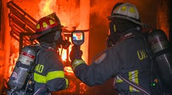 Working with crews sometimes can be more exciting than simply reviewing policies or talking tactics. Here a chief and a company officer review thermal imaging use in a live fire environment. Working with crews sometimes can be more exciting than simply reviewing policies or talking tactics. Here a chief and a company officer review thermal imaging use in a live fire environment.