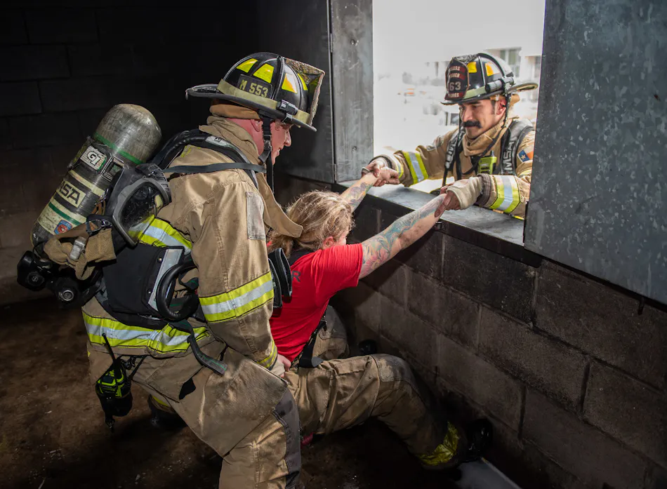 How Firefighters Make Rescues Over Ladders | Firehouse
