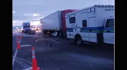 After striking the EMTs, the rig hit the ambulance.