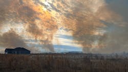 Suffolk firefighters spent several hours battling a brush fire that was sparked by a plane crash. Suffolk firefighters spent several hours battling a brush fire that was sparked by a plane crash.