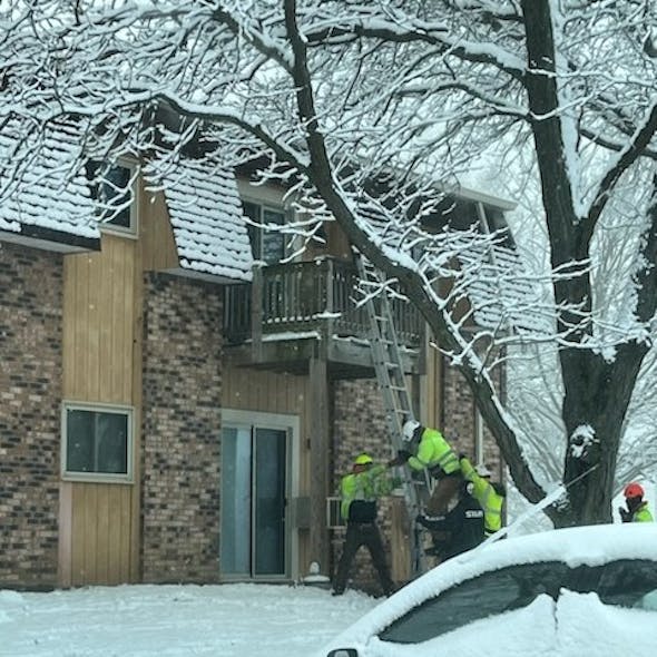 Maintenance workers and officers joined forces to rescue residents. Maintenance workers and officers joined forces to rescue residents.