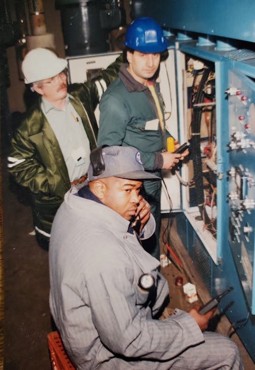Kevin Flannery (white helmet), John Daddario (blue helmet) and Willie Lucas (gray cap)