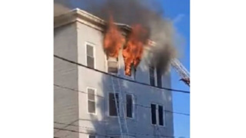 A man died of injuries after leaping from the building to escape the flames.