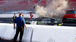 Driver Ty Gibbs (54) exits his after an on-track incident during practice for the NASCAR Clash at the Coliseum at Los Angeles Coliseum.