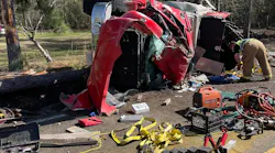The driver was pinned in the wreckage.