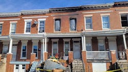 Firefighters pulled five people from this burning rowhome in Baltimore early Saturday. Firefighters pulled five people from this burning rowhome in Baltimore early Saturday.