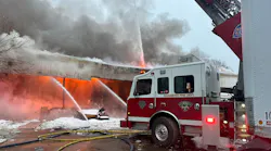 Rochester firefighters battled a five-alarm fire in a warehouse on the city's west side Monday evening.