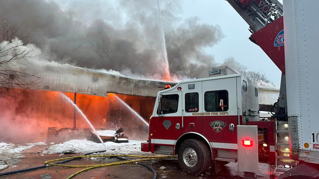 Rochester firefighters battled a five-alarm fire in a warehouse on the city's west side Monday evening. Rochester firefighters battled a five-alarm fire in a warehouse on the city's west side Monday evening.