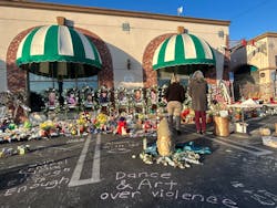 People gather following the deaths of 11 people at the Star Ballroom Dance Club on Jan. 21 in Monterey Park. People gather following the deaths of 11 people at the Star Ballroom Dance Club on Jan. 21 in Monterey Park.