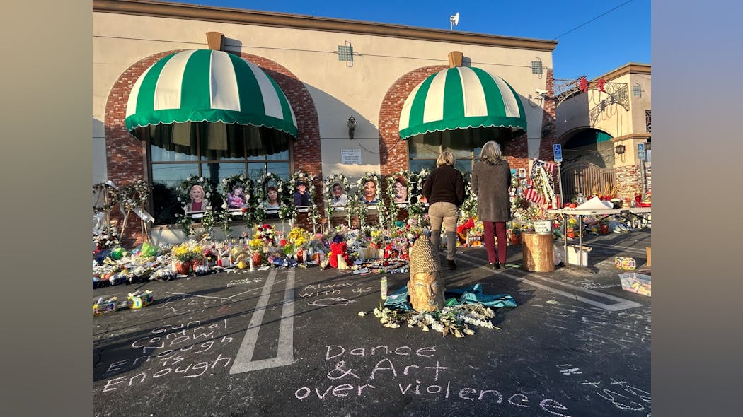 People gather following the deaths of 11 people at the Star Ballroom Dance Club on Jan. 21 in Monterey Park. People gather following the deaths of 11 people at the Star Ballroom Dance Club on Jan. 21 in Monterey Park.