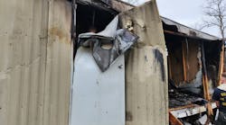 The explosion of the oxygen tank bent the rear door of the mobile home half over itself. The explosion of the oxygen tank bent the rear door of the mobile home half over itself.