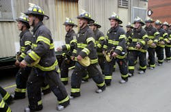 FDNY recruits marching at training academy. FDNY recruits marching at training academy.