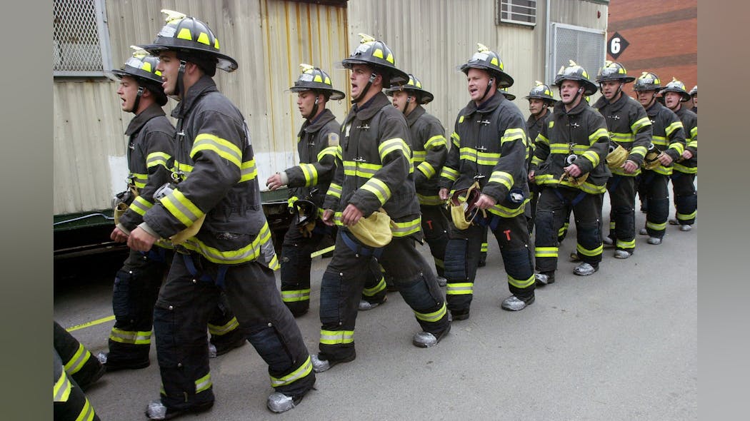 FDNY recruits marching at training academy. FDNY recruits marching at training academy.