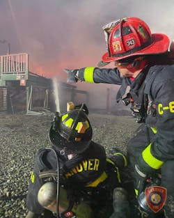 Hanover firefighter battled flames as they engulfed five beachside homes in Scituate. Hanover firefighter battled flames as they engulfed five beachside homes in Scituate.