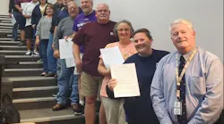Carroll County, MD Fire & EMS Director Michael Robinson, forefront, stands with volunteers recently.