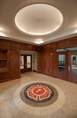 The integration of historical content within a firehouse can tell the story of a department and community and honor the firefighting profession. The entry lobby of the James City-Bruton Volunteer Fire Department & Rescue Squad station in Toano, VA, displays the original fire department logo as inlaid tile flooring. The integration of historical content within a firehouse can tell the story of a department and community and honor the firefighting profession. The entry lobby of the James City-Bruton Volunteer Fire Department & Rescue Squad station in Toano, VA, displays the original fire department logo as inlaid tile flooring.
