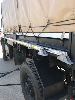 Grab handles don't need to be fancy, but they do need to be at least one inch in diameter and extend out far enough for a gloved hand to wrap around. Grab handles don't need to be fancy, but they do need to be at least one inch in diameter and extend out far enough for a gloved hand to wrap around.