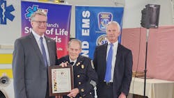 Mike Young, center, was honored for his contributions to Maryland EMS by Dr. Theodore Delbridge, right, MIEMSS executive director and Clay Stamp, Talbot County Manager and former county emergency services director. Mike Young, center, was honored for his contributions to Maryland EMS by Dr. Theodore Delbridge, right, MIEMSS executive director and Clay Stamp, Talbot County Manager and former county emergency services director.