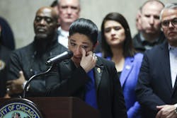 IL Comptroller Susana Mendoza wipes a tear while speaking on behalf of her brother, police Sgt. Joaquin Mendoza, during a news conference at Chicago&apos;s City Hall on Feb. 21, 2023.