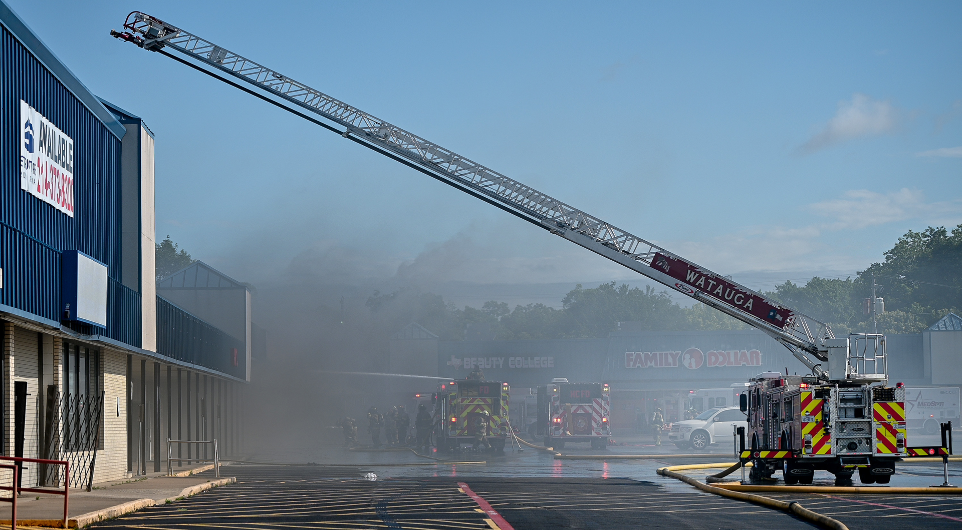 Fire walls and smoke dampers prevented the spread of flames at this commercial building fire. Despite the usefulness of these and other smoke containment systems and of smoke management systems, they can lead firefighters to misread signs during a size-up. This adds to the importance of preplanning one's community.