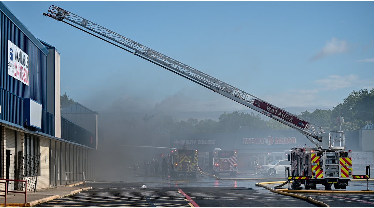 Fire walls and smoke dampers prevented the spread of flames at this commercial building fire. Despite the usefulness of these and other smoke containment systems and of smoke management systems, they can lead firefighters to misread signs during a size-up. This adds to the importance of preplanning one&apos;s community.