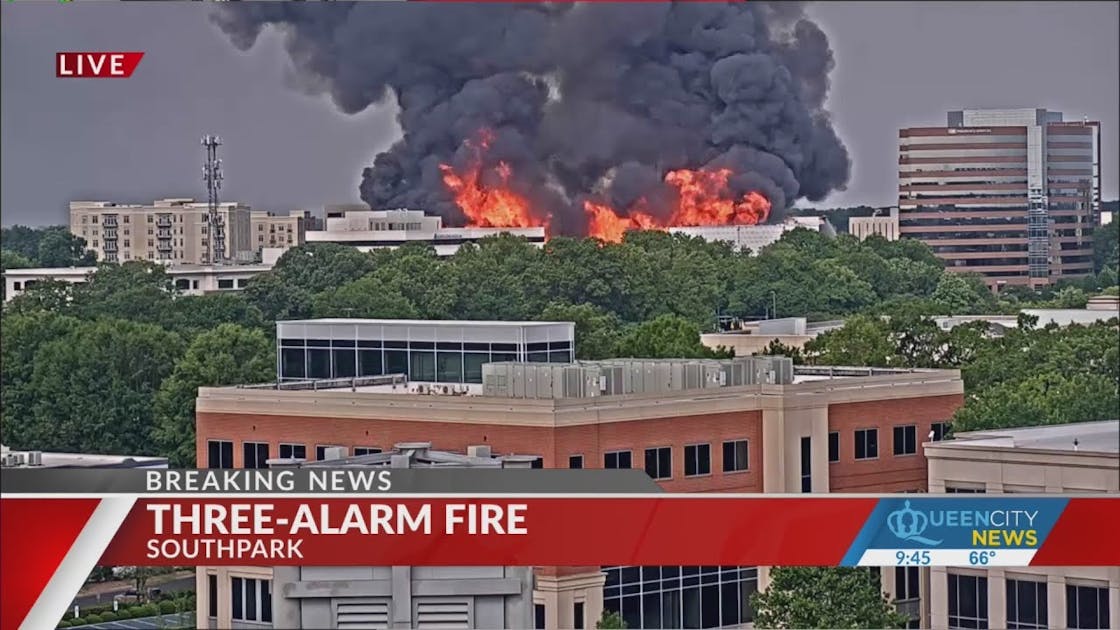 What building in burning in SouthPark in Charlotte, NC?