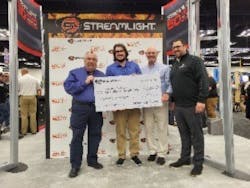 Streamlight donated $21,000 to the NFFF in support of the families and colleagues they left behind. A check was presented to Chief Ronald Siarnicki (left), Executive Director of the National Fallen Firefighters Foundation at the recent FDIC International Conference. Also on hand (second from left to right) were Ross Mulkerrin, Development Manager of the NFFF; Allen Lance, Streamlight’s Vice President of Sales; and Aaron Freund, Streamlight's Director of Sales – Industrial and Fire Divisions. Streamlight donated $21,000 to the NFFF in support of the families and colleagues they left behind. A check was presented to Chief Ronald Siarnicki (left), Executive Director of the National Fallen Firefighters Foundation at the recent FDIC International Conference. Also on hand (second from left to right) were Ross Mulkerrin, Development Manager of the NFFF; Allen Lance, Streamlight’s Vice President of Sales; and Aaron Freund, Streamlight's Director of Sales – Industrial and Fire Divisions.
