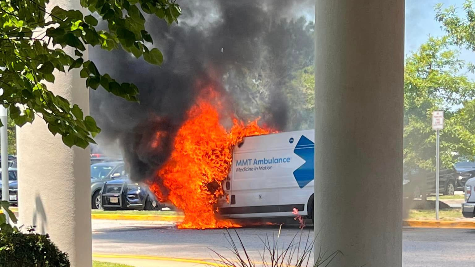 Photos on the Norfolk Fire Rescue Facebook page show the ambulance's engine compartment completely engulfed in flames.