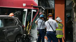 Firefighters at the scene of a multi-vehicle crash that involved an MTA bus and two other cars in Baltimore Saturday.