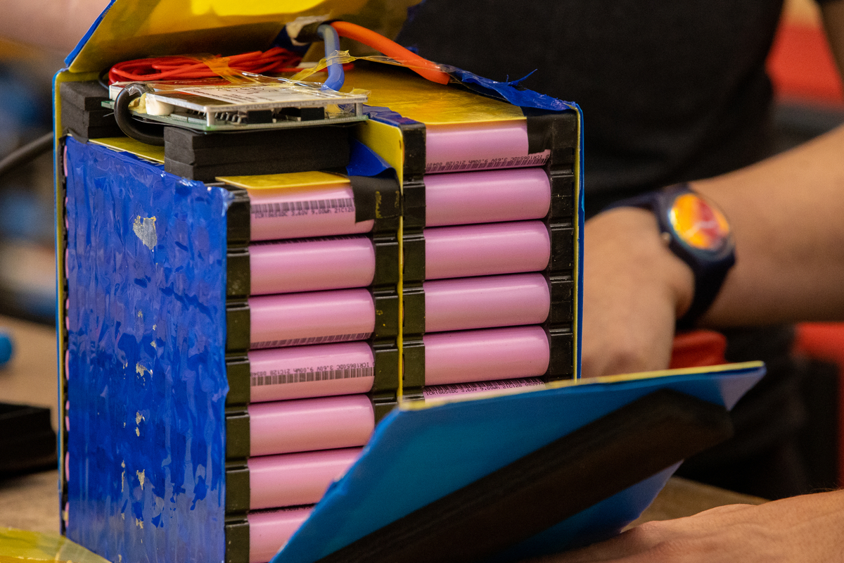 E-scooter battery pack removed from metal enclosure to show how the individual 18650 cells were configured.